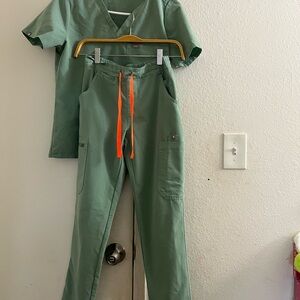 Women's figs jade Scrub Set with Orange Accents